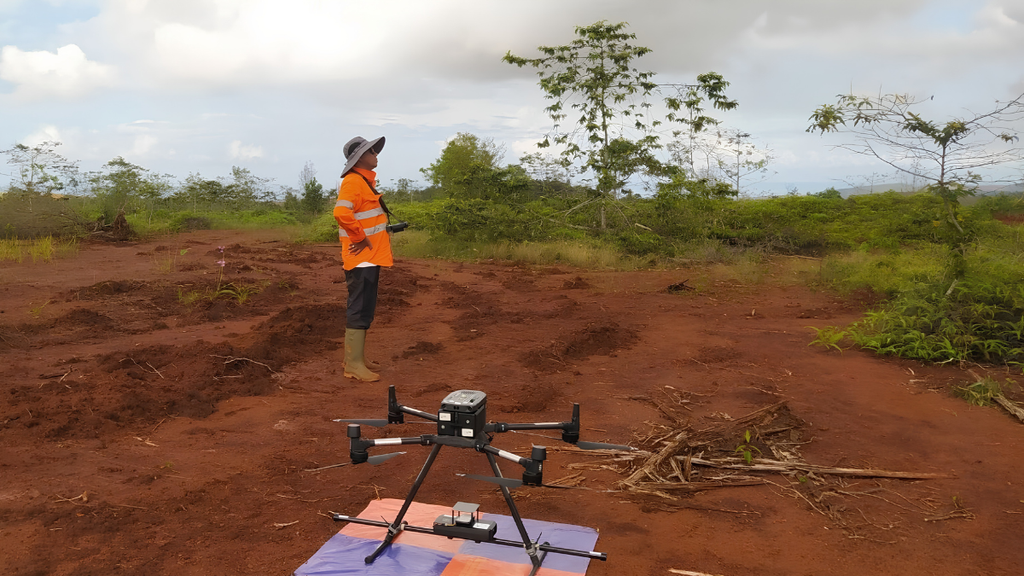 Drone Magnetic Survey UAV flying above a mineral exploration site