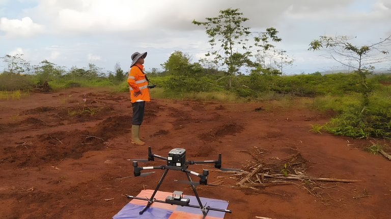 Drone Magnetic Survey UAV flying above a mineral exploration site