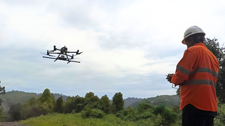 Drone Magnetic Survey UAV flying a low-altitude survey over a mineral exploration site